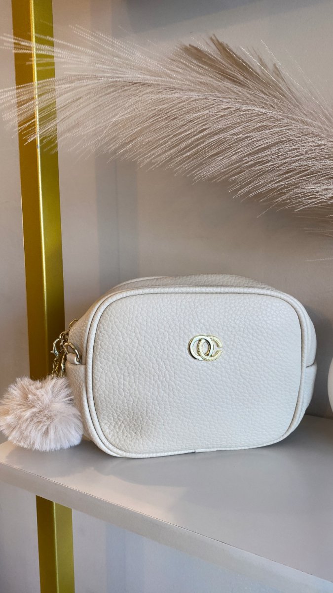Bolsa com pompom
